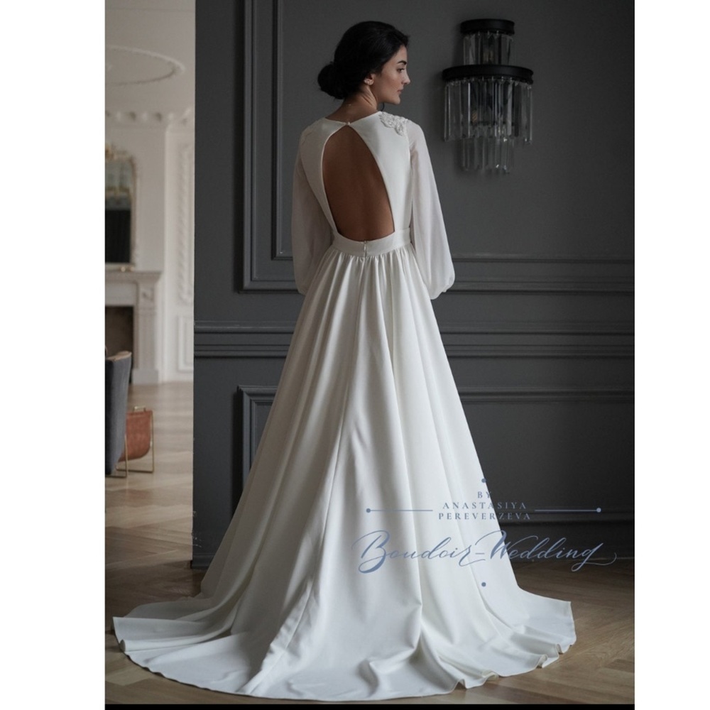 Ivory Long Sleeve Open-Back Wedding Gown